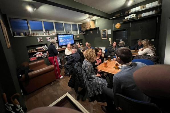 Interior of the Snug which is filled with people